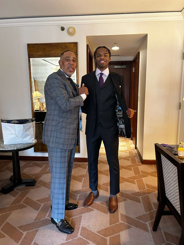 Ebuka Okorie in custom three-piece black suit by CJ Custom Clothiers for 2026 NBA Draft