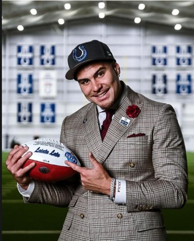 Liaiatu Latu in custom 2x6 double-breasted suit by CJ Custom Clothiers at NFL Draft